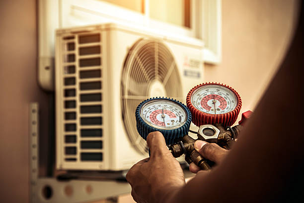 Professional Hvac technician working in Utica, IN